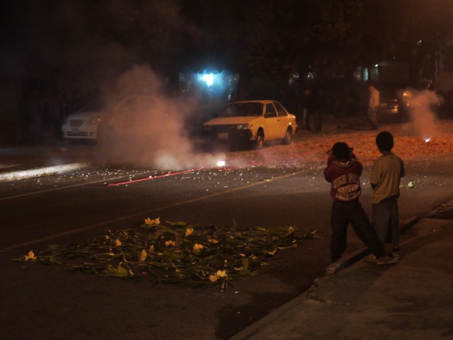 Christmas celebrations start early with fire poppers and flowers in Guatemala city